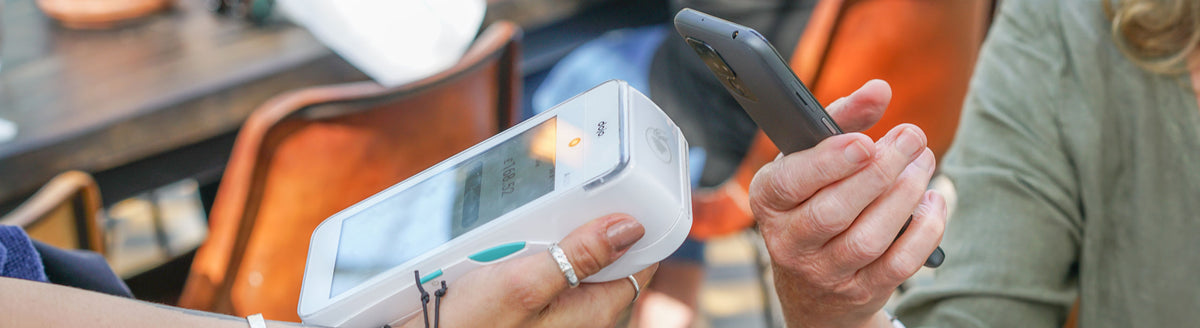 Paying with a Doro smartphone at a card reader