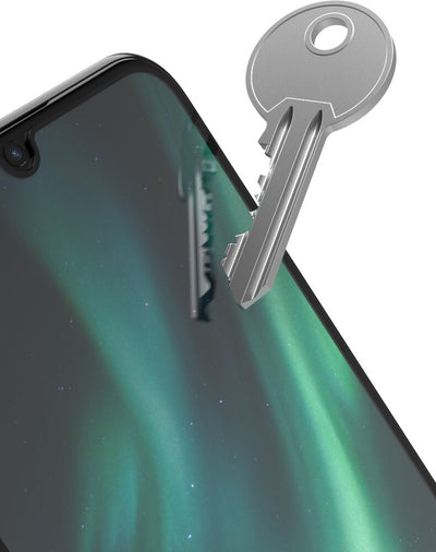 Smartphone with a key on a white background