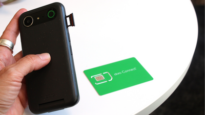 A Doro phone and the Doro Connect SIM card on a table