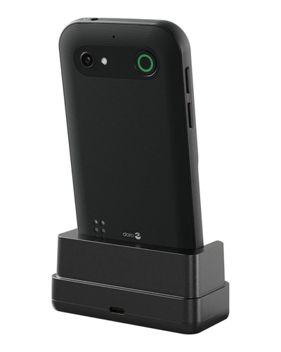 Black smartphone docked on a white background