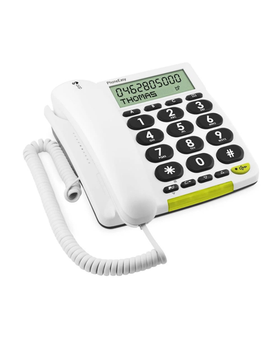 White telephone with green accents on a white background