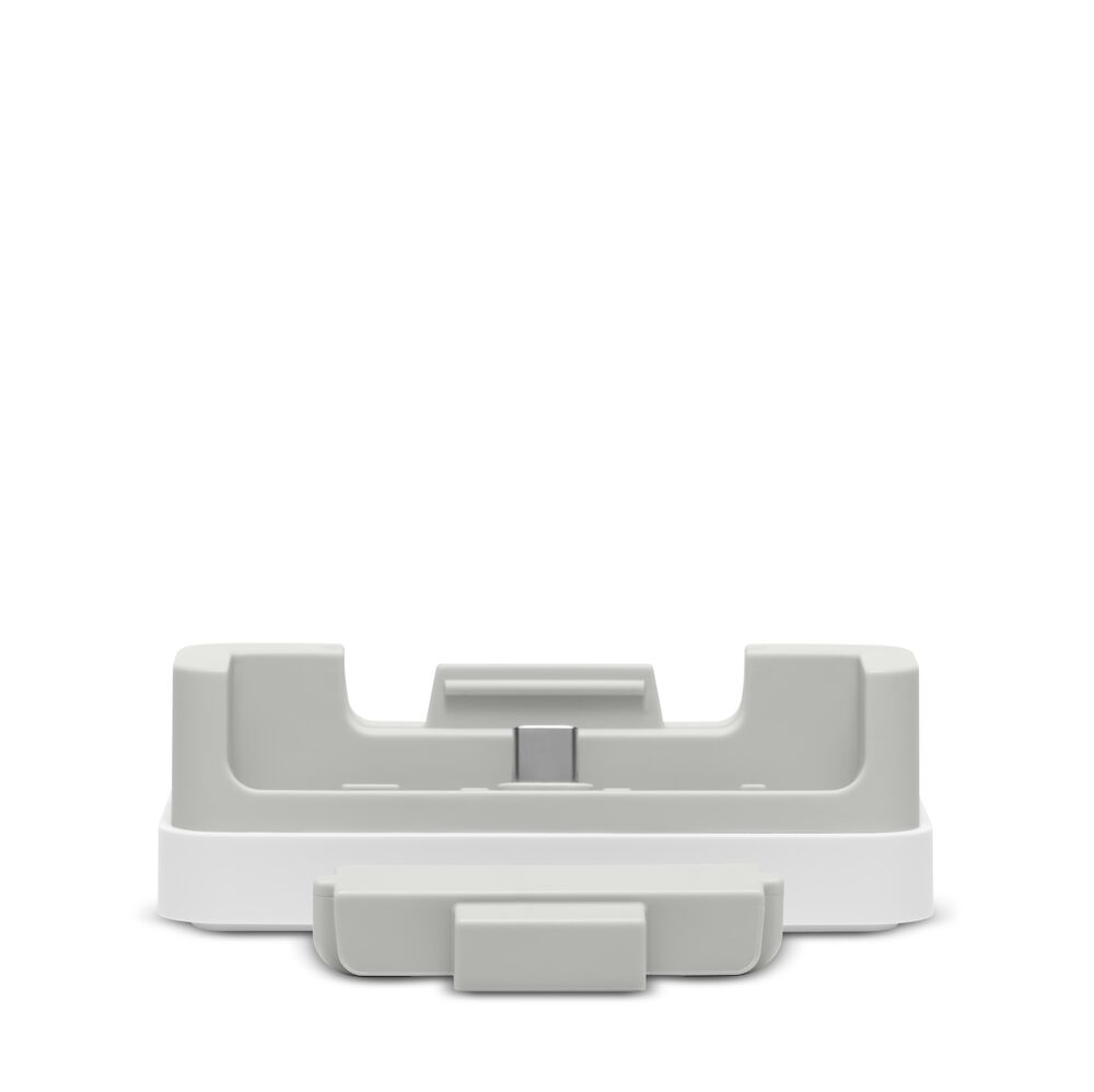 White and gray electronic device stand on a white background
